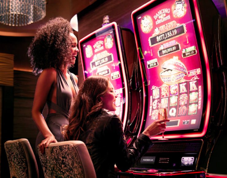 Mobile phone showing live baccarat table and GoPay balance update on slot gaco